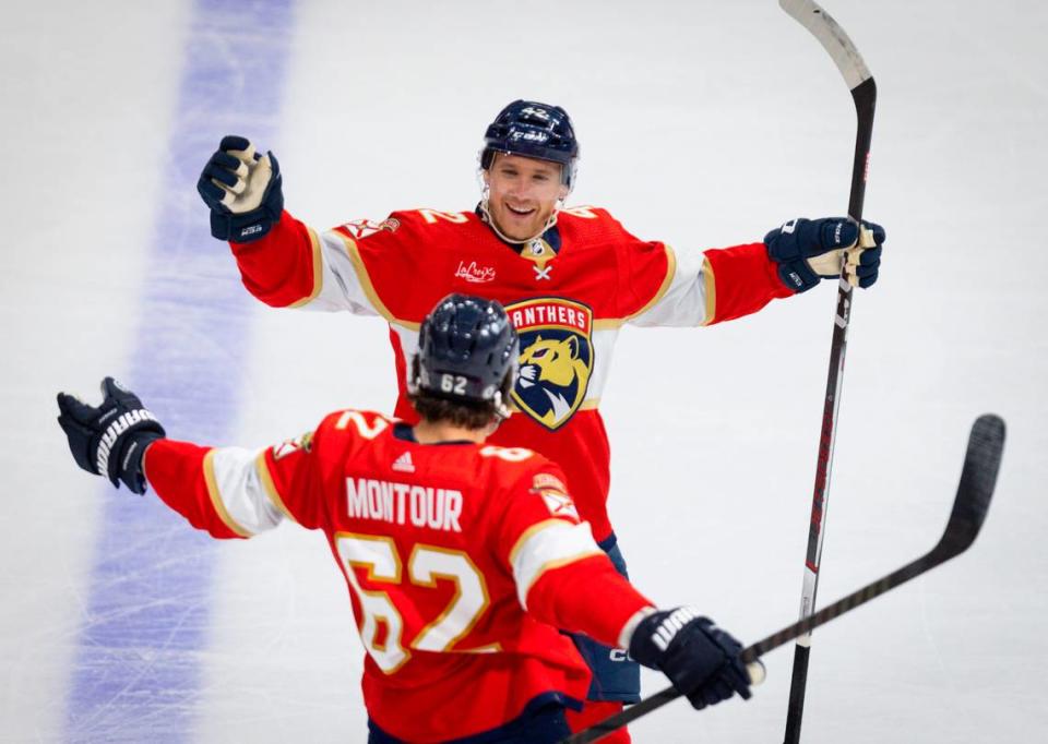 Florida Panthers defenseman Gustav Forsling (42) smiles at Florida Panthers defenseman Brandon Montour (62) after Montour scores a goal during the second period of a hockey game on Tuesday, April 16, 2024, at Amerant Bank Arena in Sunrise, Fla. The Florida Panthers scored 4 goals in the period to take the lead 4-2 against the Toronto Maple Leafs.