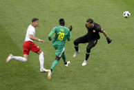 <p>Mbaye Niang passes Poland goalkeeper Wojciech Szczesny to score Senegal’s second goal </p>