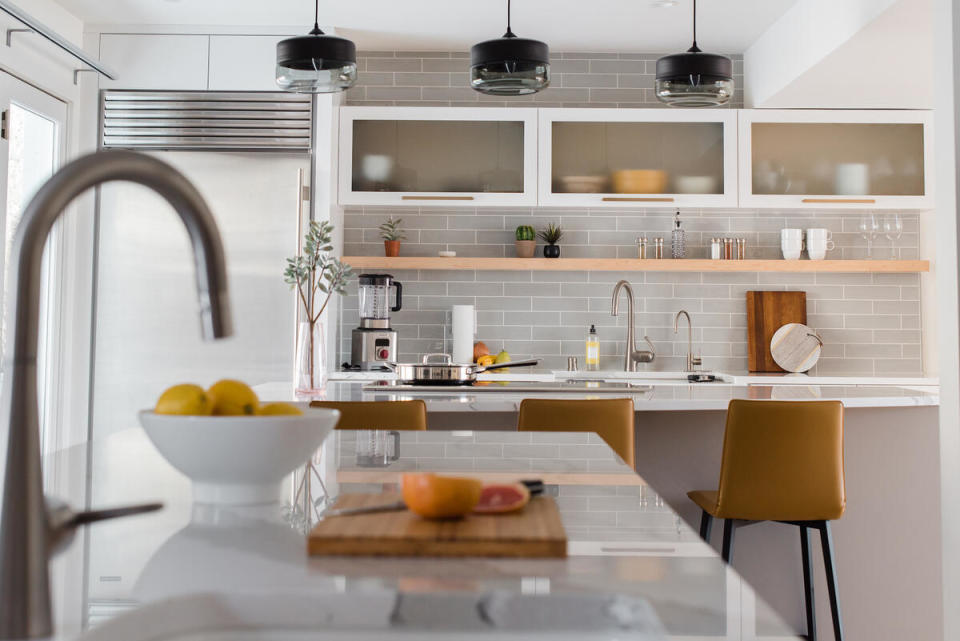 A pair of islands create complementary work spaces in a kitchen renovation