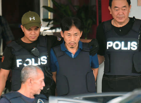 North Korean suspect in Kim Jong Nam murder, Ri Jong Chol, leaves a Sepang police station to be deported. Mandatory credit Kyodo/via REUTERS