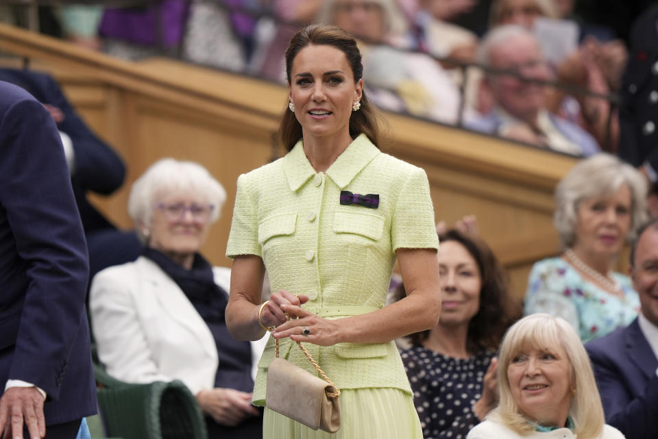 Kate, Princess of Wales arrives in the Royal Box ahead of the final of the women's singles between the Czech Republic's Marketa Vondrousova and Tunisia's Ons Jabeur on day thirteen of the Wimbledon tennis championships in London, Saturday, July 15, 2023. (AP Photo/Alberto Pezzali)