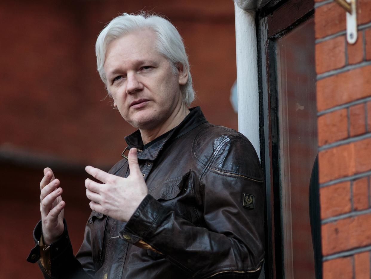 Julian Assange, the founder of WikiLeaks, speaks to the media from the balcony of Ecuador's embassy in London: Jack Taylor/Getty Images