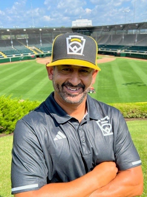 Nolensville coach Chris Mercado poses at Little League World Series in South Williamsport, Pa.