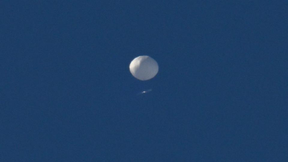 PHOTO: In this Feb. 4, 2023, file photo, a Chinese surveillance balloon is seen flying above Charlotte, N.C.  (Peter Zay/Anadolu Agency via Getty Images, FILE)