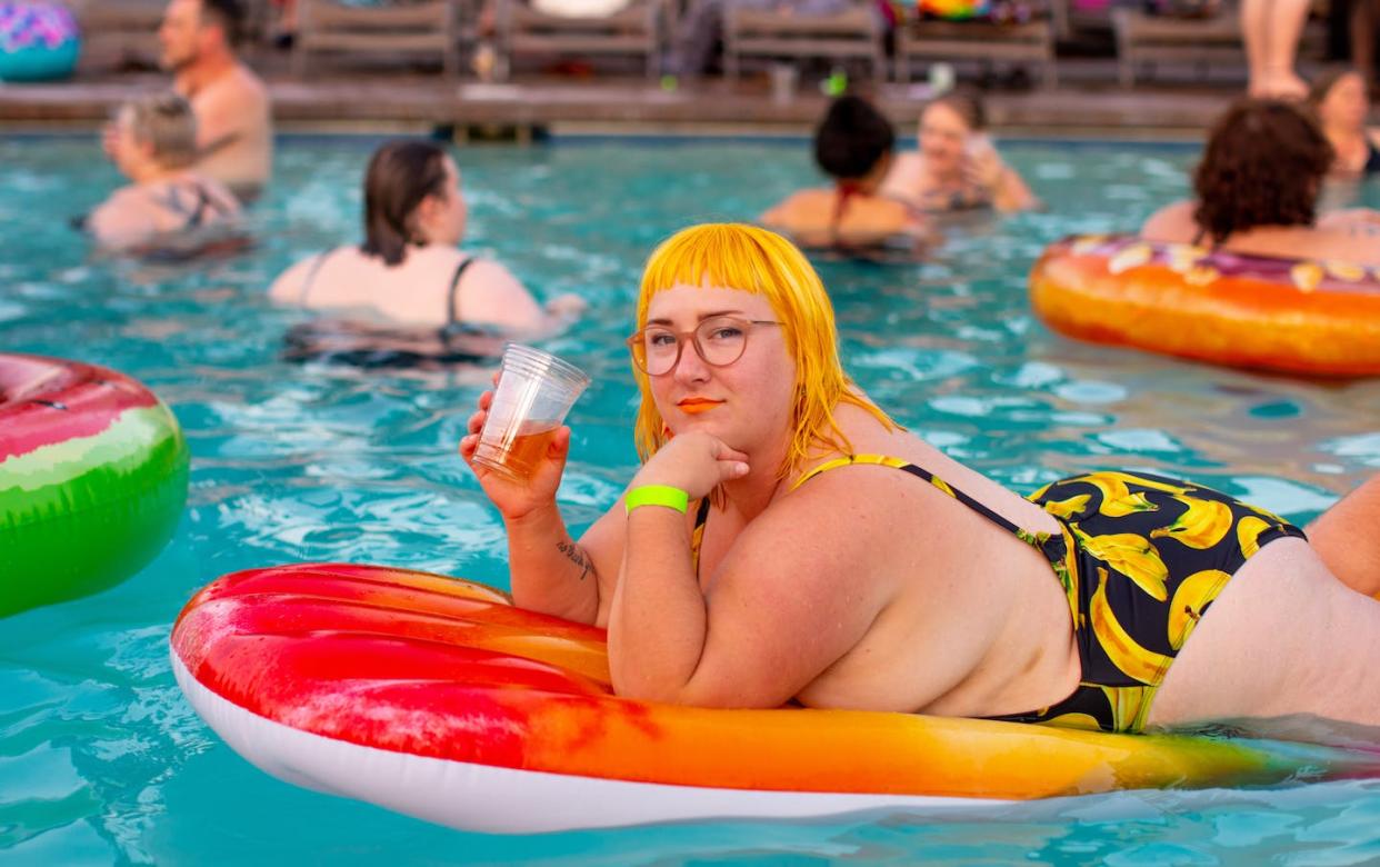A woman relaxes in the pool: in their memoir, Australian writer Kris Kneen describes the freedom they find in the water. Allgo An App for Plus-size People/Unsplash, <a href="http://creativecommons.org/licenses/by/4.0/" rel="nofollow noopener" target="_blank" data-ylk="slk:CC BY;elm:context_link;itc:0;sec:content-canvas" class="link ">CC BY</a>