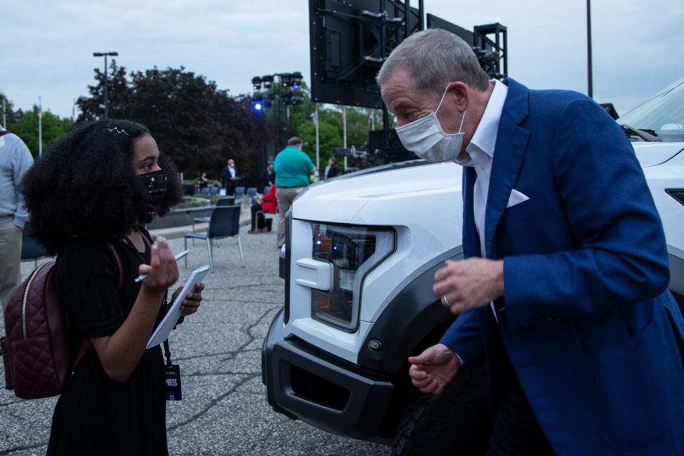 Allegra Blackwood, 13, of Ann Arbor interviews Bill Ford, executive chair of Ford Motor Co. in Dearborn before the F-150 Lightning reveal on May 19, 2021.
