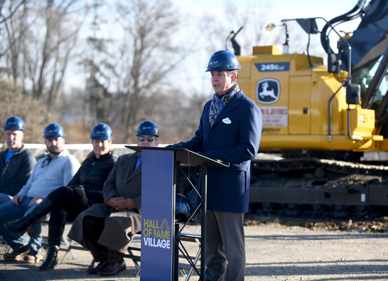 Michael Crawford, president and chief executive officer of the Hall of Fame Village speaks as they break ground an a football-themed indoor water park in this December 2022 photo.