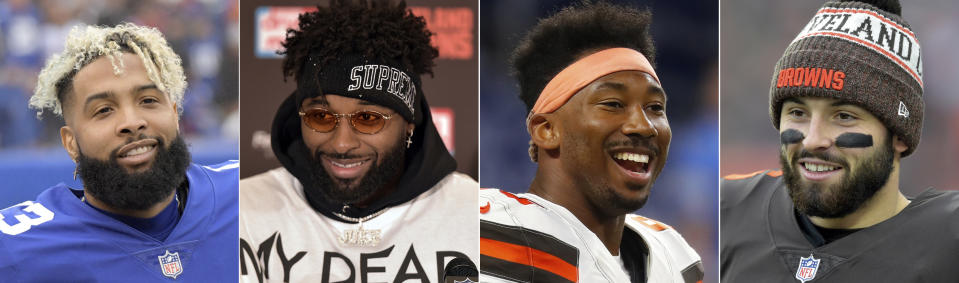 FILE - These are 2018 file photos showing, from left, New York Giants wide receiver Odell Beckham, Cleveland Browns wide receiver Jarvis Landry, Browns defensive end Myles Garrett and Browns quarterback Baker Mayfield. One of the architects of Kansas City’s turnaround, Cleveland Browns general manager John Dorsey has revamped a Cleveland roster that now includes Beckham, Landry, Garrett and Mayfield. (AP Photo/File)