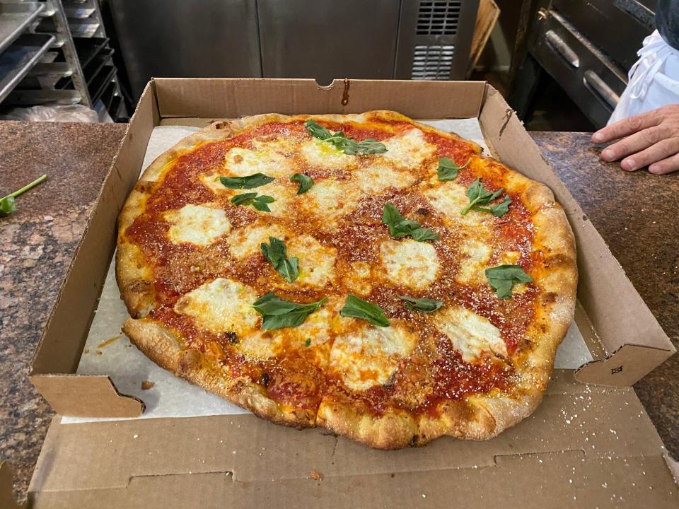 Here's PizzAmore Italian Kitchen's Di Fara-inspired pie referring to the late pizza making legend Domenico Di Dara of Brooklyn.