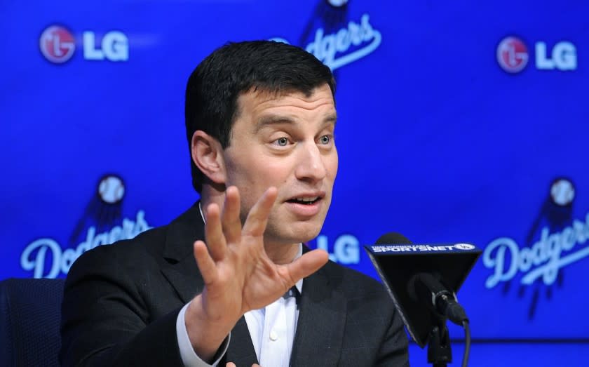 Andrew Friedman fields a question, or likely sidesteps it, during his introductory news conference on Friday.