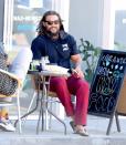 <p>Jason Momoa enjoys the fresh air and a fresh juice in L.A. on Tuesday. </p>