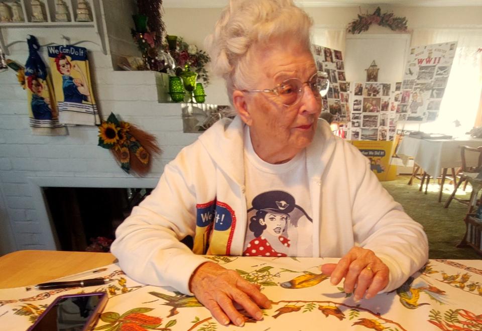 Mae "Rosie the Riveter" Krier at home amid many mementoes of her extraordinary life.