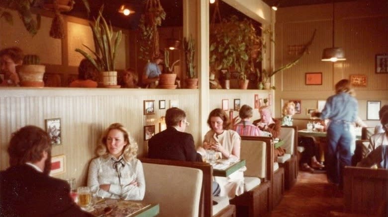 vintage photo of diners eating at Chili's