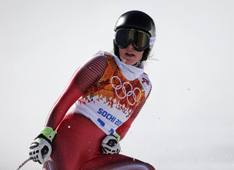 Switzerland's Lara Gut arrives in the finish area during a women's downhill training run at the Sochi 2014 Winter Olympics, Thursday, Feb. 6, 2014, in Krasnaya Polyana, Russia. (AP Photo/Gero Breloer)
