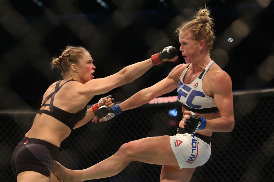 MELBOURNE, AUSTRALIA - NOVEMBER 15:  Ronda Rousey of the United States  (L) and Holly Holm of the United States compete in their UFC women's bantamweight championship bout during the UFC 193 event at Etihad Stadium on November 15, 2015 in Melbourne, Australia.  (Photo by Pat Scala /Zuffa LLC/Zuffa LLC via Getty Images)