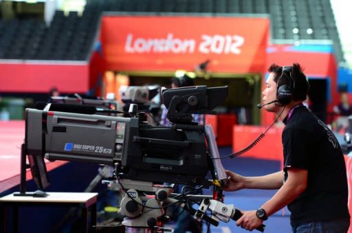 A cameraman tests his equipment one day before the start of the London 2012 Olympic Games on July 24. Video replay technology will be used at the Olympic judo competition for the first time in an effort to eradicate judging controversies