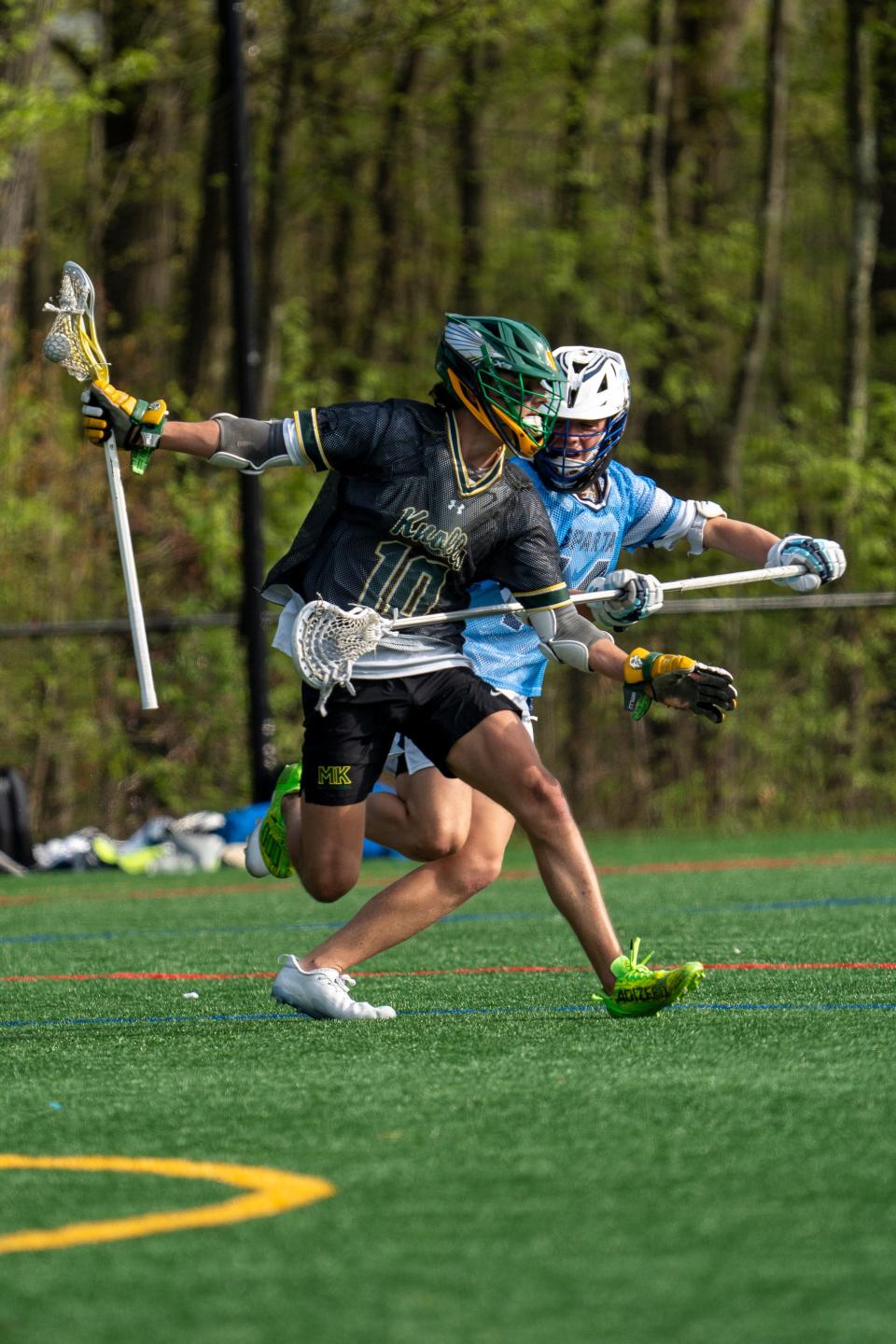 Apr 30, 2024; Denville, NJ, USA; Morris Knolls hosts Sparta in NJAC National boys lacrosse game on Tuesday afternoon. MK#10 Kyle Hardie and S #14 Stone Herbison.