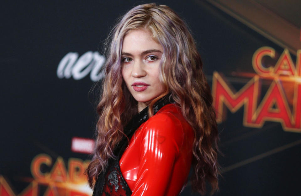 Grimes feels guilty admitting she does not want to go back on tour credit:Bang Showbiz