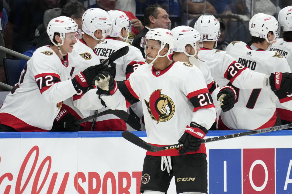 Ottawa Senators right wing Mathieu Joseph (21) celebrates with the bench after his goal against the Tampa Bay Lightning during the second period of an NHL hockey game Tuesday, Nov. 1, 2022, in Tampa, Fla. (AP Photo/Chris O'Meara)