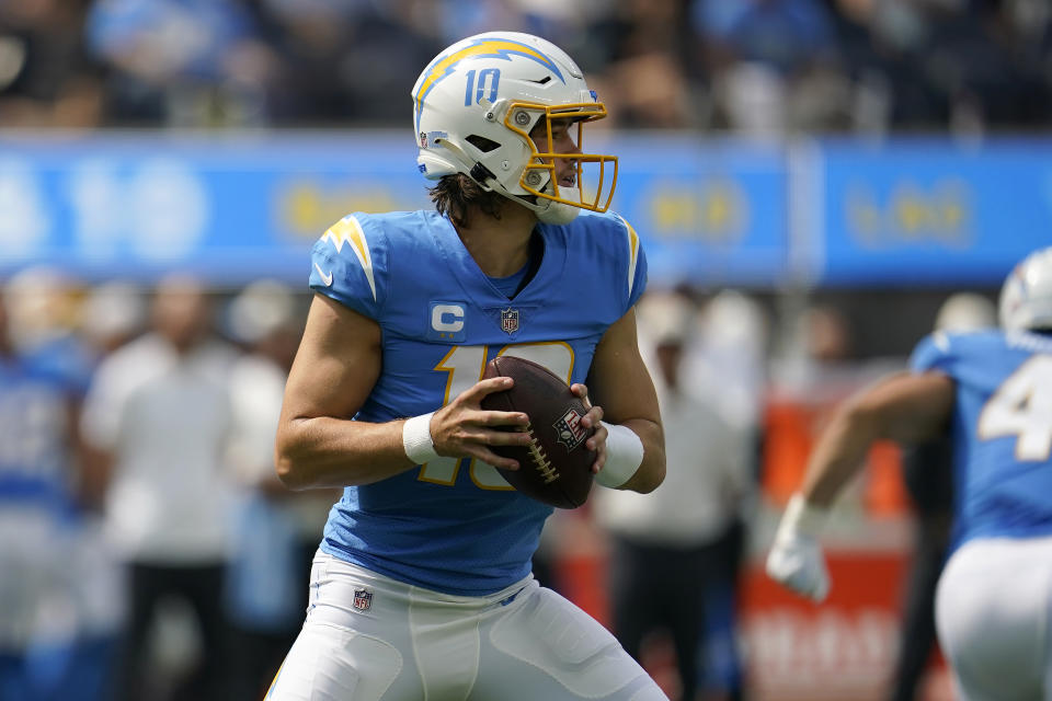 Los Angeles Chargers quarterback Justin Herbert drops back against the Jacksonville Jaguars during the first half of an NFL football game in Inglewood, Calif., Sunday, Sept. 25, 2022. (AP Photo/Marcio Jose Sanchez)