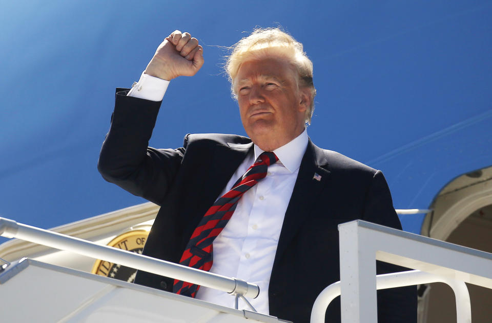 <p>President Donald Trump pumps his fist as he arrives to attend the nearby G7 Summit in Charlevoix after landing aboard Air Force One at Canadian Forces Base Bagotville in La Baie, Quebec, Canada, June 8, 2018. (Photo: Leah Millis/Reuters) </p>