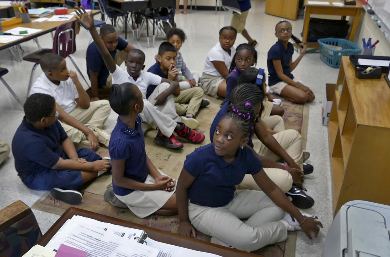 Students in teacher Marie Calabro's fifth-grade class on the first day of year-round school at Bruns Academy on July 24, 2017, in Charlotte, N.C. (Photo: Davie Hinshaw/The Charlotte Observer via AP)