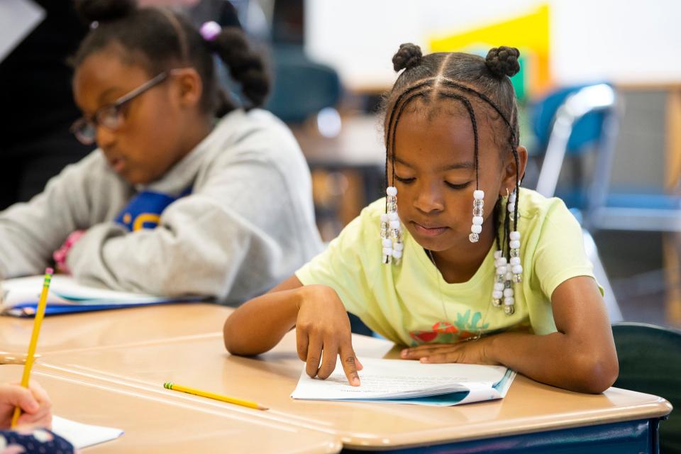 Students work on a reading assignment during summer classes at Christenberry Elementary in 2022.