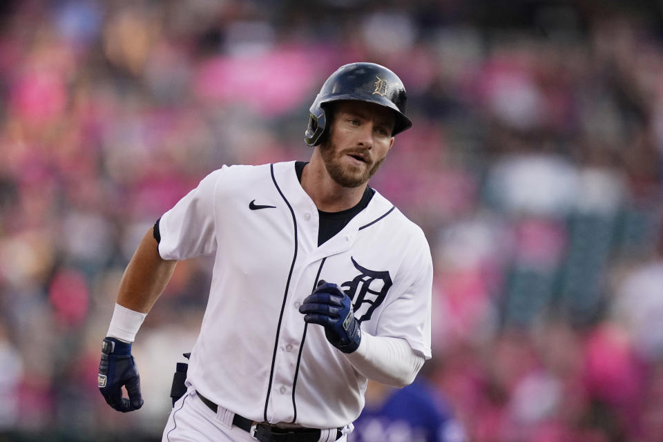 Detroit Tigers' Robbie Grossman rounds the bases after a solo home run off Texas Rangers starting pitcher Jordan Lyles during the first inning of a baseball game, Wednesday, July 21, 2021, in Detroit. (AP Photo/Carlos Osorio)