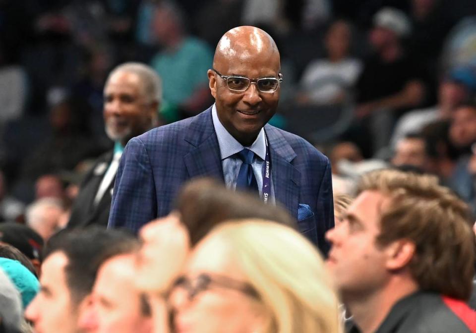 Charlotte Hornets team president Fred Whitfield walks through the seating area at Spectrum Center during the team’s game against the Brooklyn Nets on October 30, 2023.
