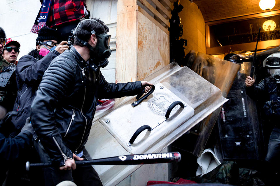 Trump supporters clash with police and security forces as people try to storm the U.S. Capitol. (Brent Stirton / Getty Images file)