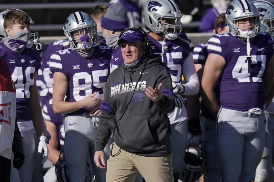 FILE - In this Dec. 5, 2020, file photo, Kansas State head coach Chris Klieman directs his team during the first half of an NCAA college football game against Texas in Manhattan, Kan. (AP Photo/Orlin Wagner, File)