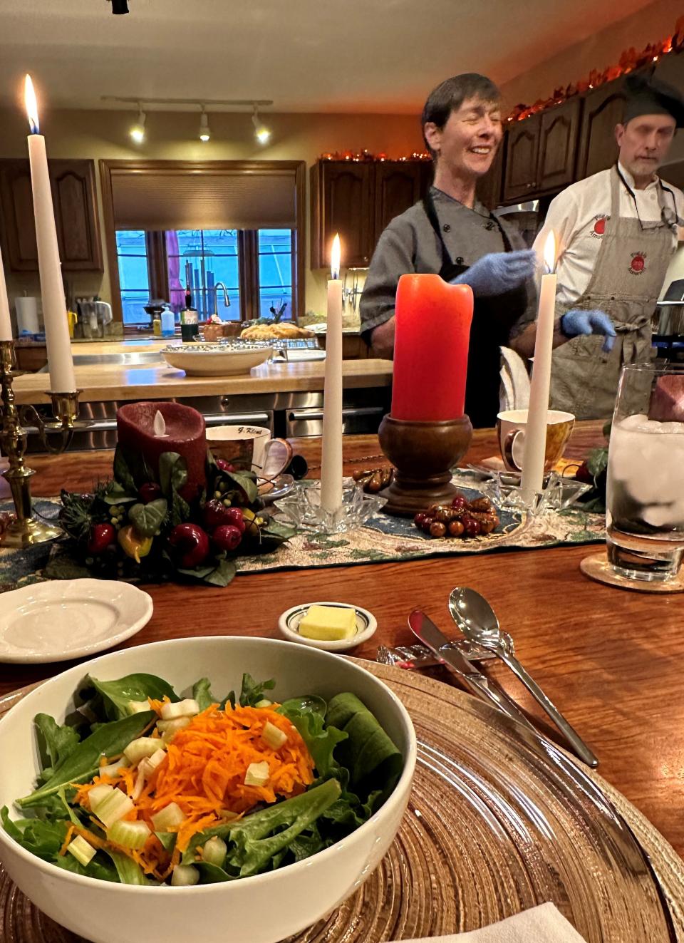 Chef Angela Marie Perkins introduces the dinner menu to guests at a recent specialty event served in the chef's kitchen of Poggio Amorelli Bed and Breakfast in North Canton.