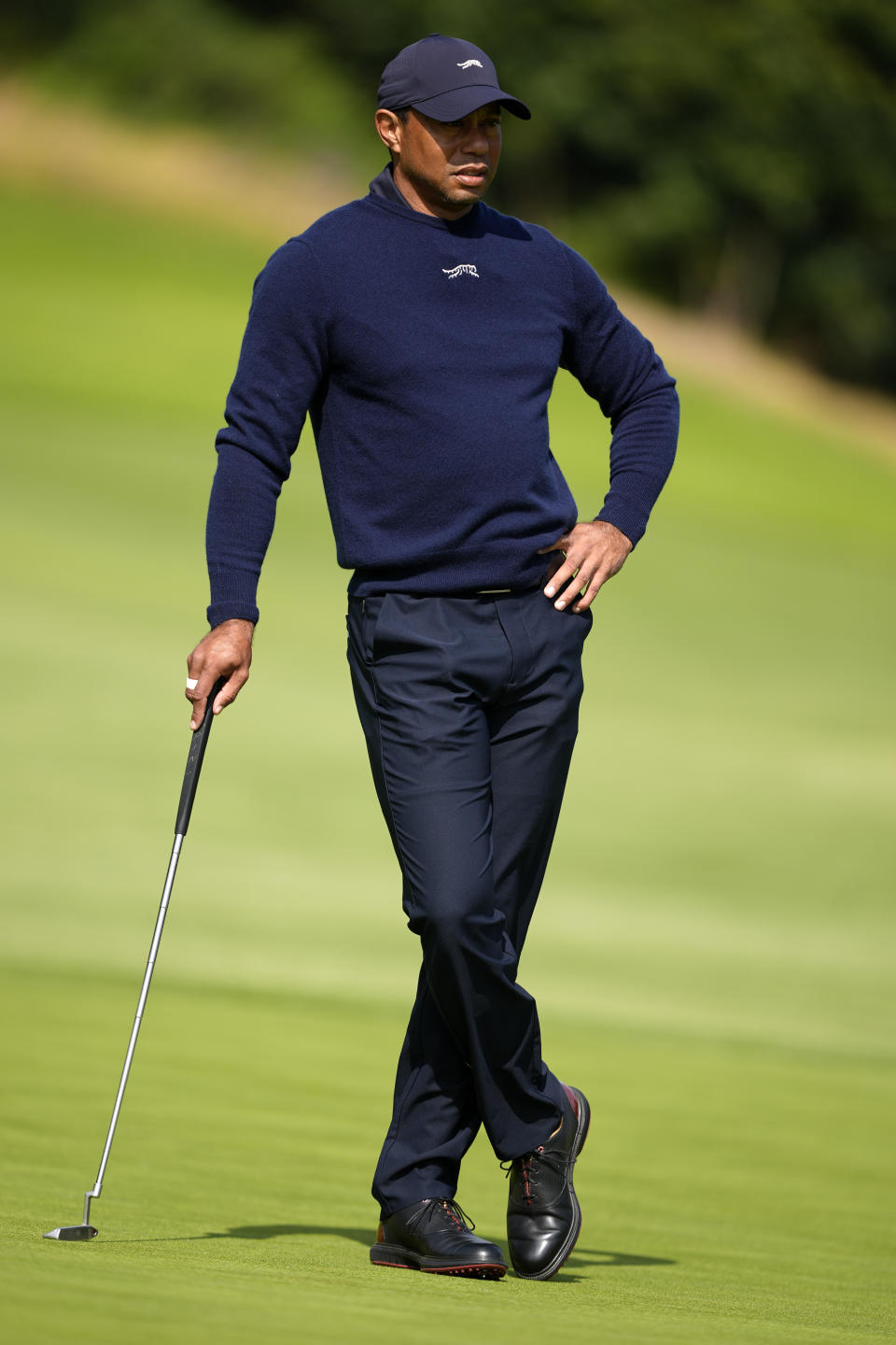 Tiger Woods stand on the fourth green during the second round of the Genesis Invitational golf tournament at Riviera Country Club Friday, Feb. 16, 2024, in the Pacific Palisades area of Los Angeles. (AP Photo/Ryan Sun)