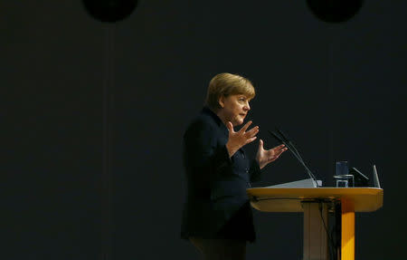 German Chancellor Angela Merkel and leader of the Christian Democratic Union (CDU) makes her keynote speech during the CDU party congress in Karlsruhe, Germany December 14, 2015. REUTERS/Kai Pfaffenbach