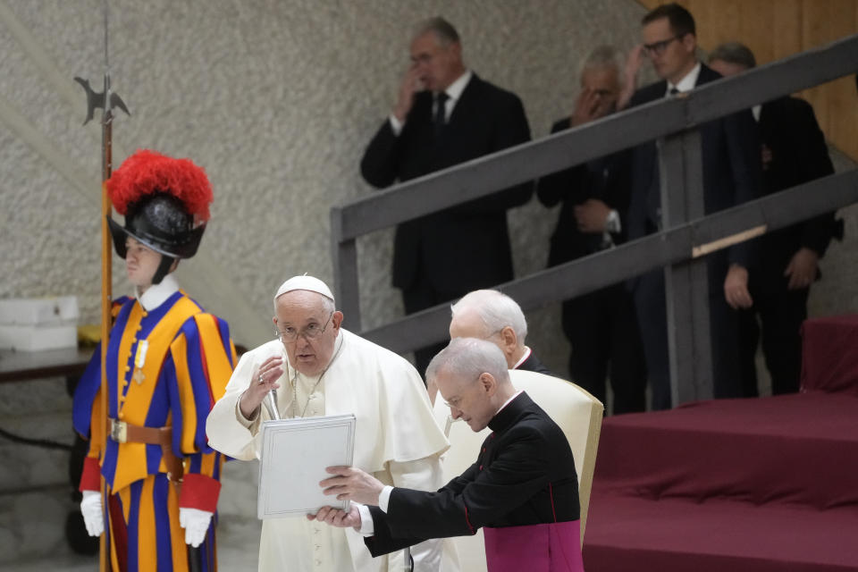 Pope Francis delivers his blessing during the weekly general audience at the Vatican, Wednesday, Dec. 13, 2023. (AP Photo/Gregorio Borgia)