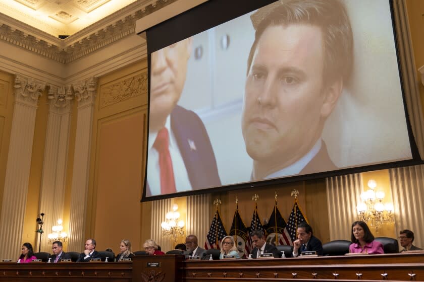 WASHINGTON, DC - JUNE 13: A still photograph of William Stepien, former Trump Campaign manager is seen on screen while excerpts of his deposition is played during a House Select Committee to Investigate the January 6th hearing in the Cannon House Office Building on Monday, June 13, 2022 in Washington, DC. The bipartisan Select Committee to Investigate the January 6th Attack On the United States Capitol has spent nearly a year conducting more than 1,000 interviews, reviewed more than 140,000 documents day of the attack. (Kent Nishimura / Los Angeles Times)