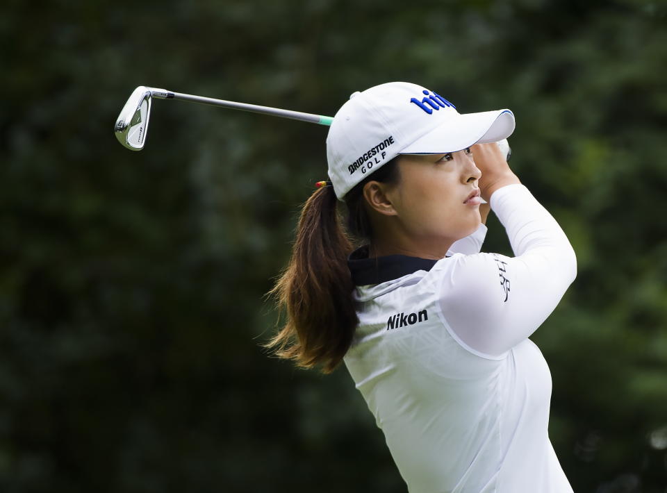 Jin Young Ko, of South Korea, watches her tee shot on the 17th hole during the first round of the CP Women's Open golf tournament in Aurora, Ontario, Thursday, Aug. 22, 2019. (Nathan Denette/The Canadian Press via AP)
