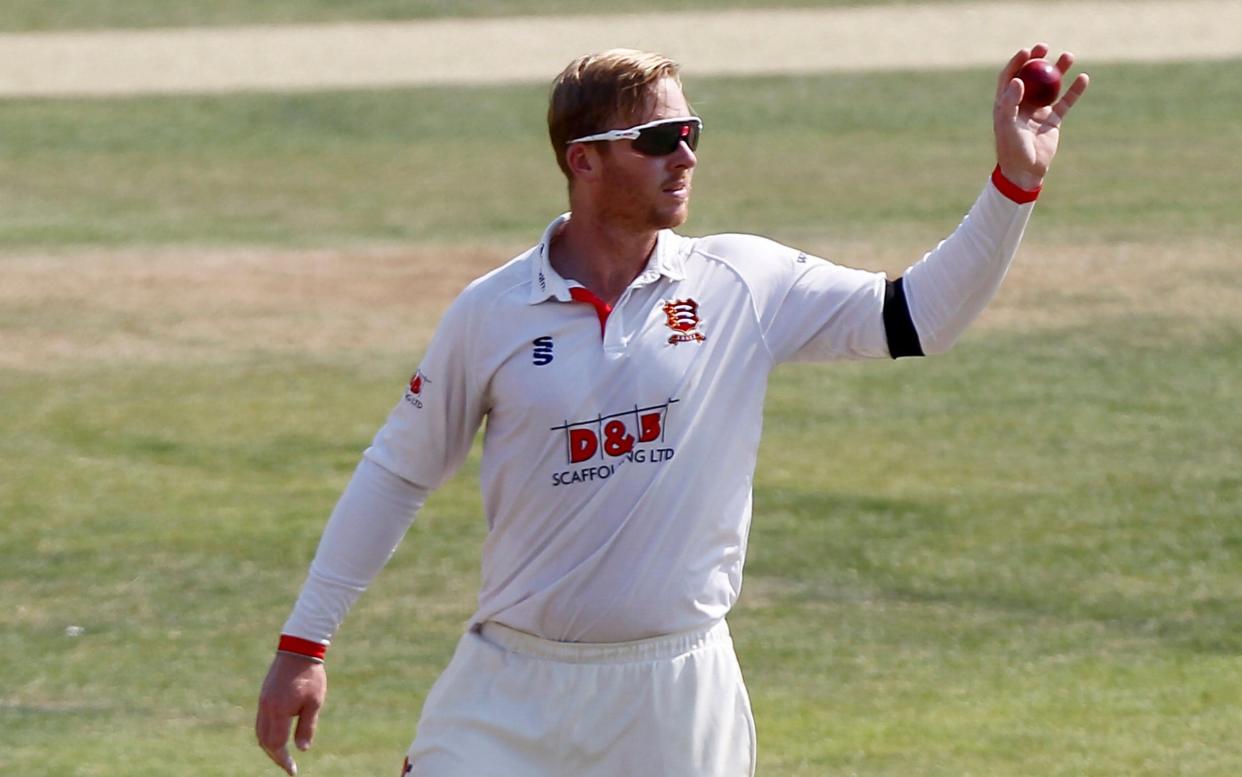 Simon Harmer of Essex collects the ball ready to bowl again during day four of the Bob Willis Trophy match between Essex and Kent - Getty Images