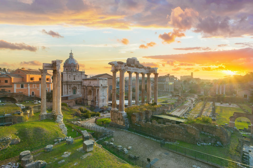 Arch of Septimius Severus, the ruins of Temple of Saturn, the remains of the colonnade of Basilica Julia, the ruins of Temple of Castor and Pollux (the ruin with three columns). Arch of Titus is visible in the distance.