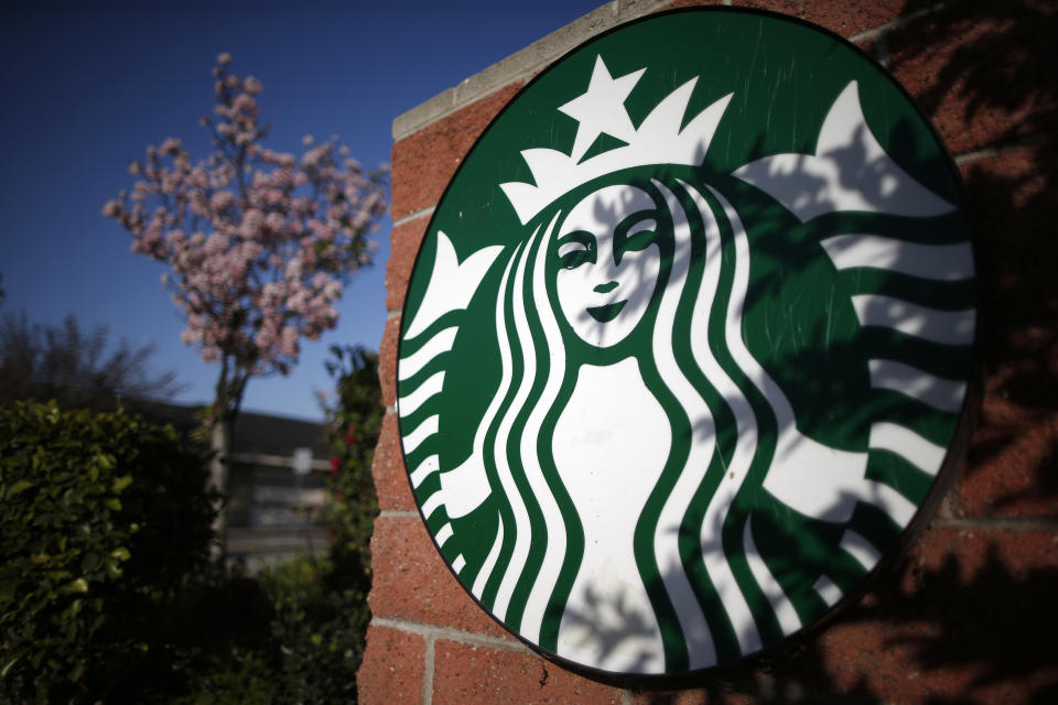 A Starbucks logo on a store in Los Angeles, California, March 10, 2015.  REUTERS/Lucy Nicholson (UNITED STATES - Tags: BUSINESS LOGO FOOD)