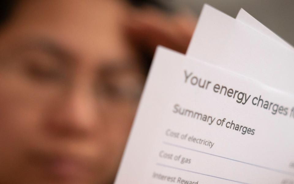 A person holding an energy bill - Danny Lawson/ PA