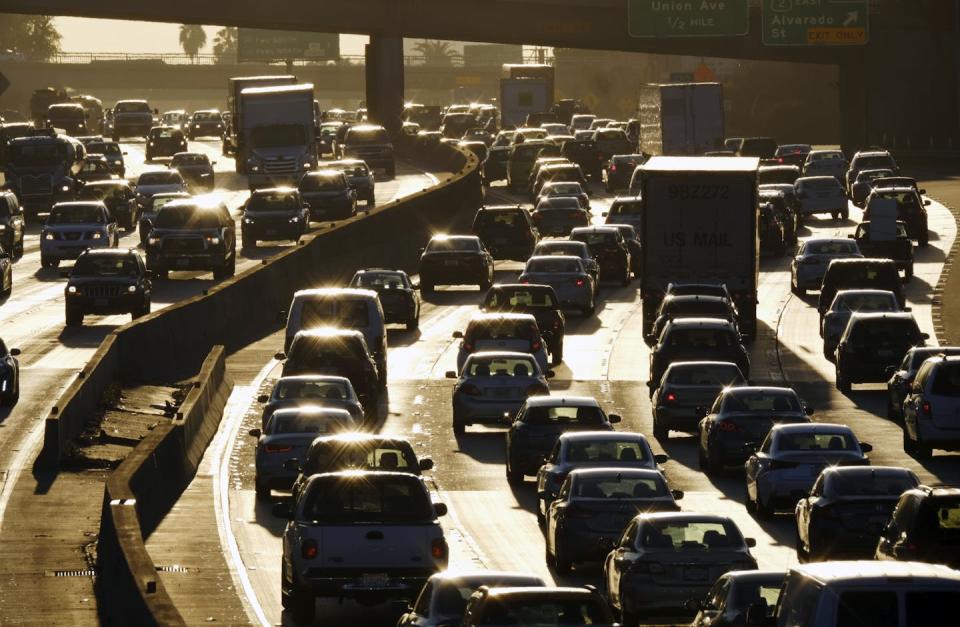 Cars stuck in afternoon traffic in a busy city