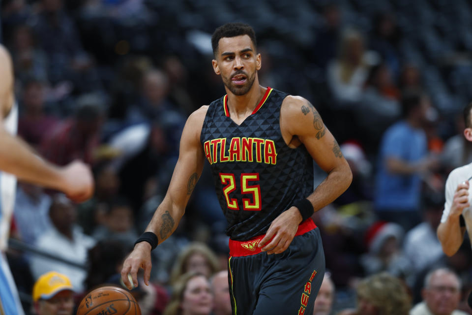 FILE - This Dec. 23, 2016 file photo shows Atlanta Hawks forward Thabo Sefolosha (25), of Switzerland, in the second half of an NBA basketball game in Denver. Sefolosha has settled his lawsuit against New York City that stemmed from a police fracas outside a trendy Manhattan nightclub. The Daily News reports Wednesday, April5, 2017 that Sefolosha will get $4 million. (AP Photo/David Zalubowski, file)