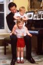 <p>Charles poses with his two sons, Harry and William, for a portrait at Kensington Palace. </p>