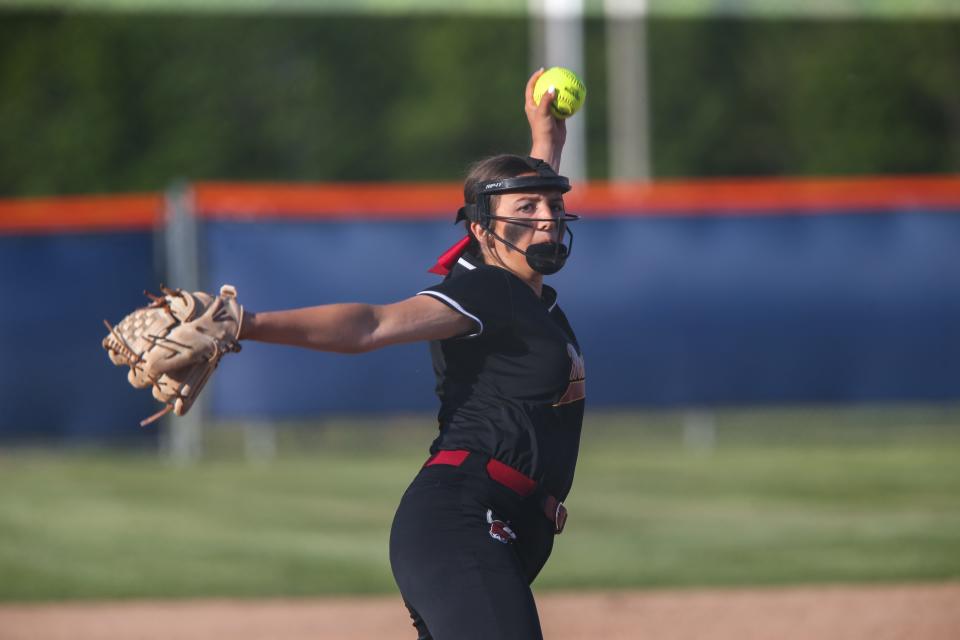 McCutcheon Mavericks Kaidynn Peckinpaugh (11) winds up a pitch during the 2022-23 IHSAA Class 4A softball sectional tournament finals against the Harrison Raiders, Thursday, May 25, 2023, at Harrison High School in West Lafayette, Ind. Harrison won 9-0.