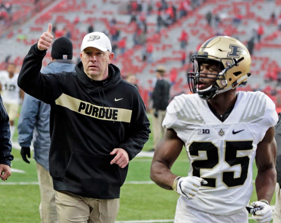 Purdue head coach Jeff Brohm gives a thumbs-up to fans as he leaves the field following an NCAA college football game against Nebraska in Lincoln, Neb., Saturday, Sept. 29, 2018. Purdue won 42-28. (AP Photo/Nati Harnik)