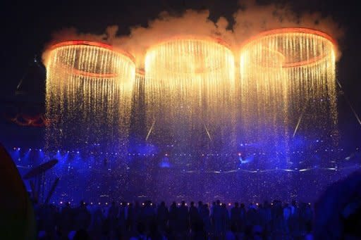 Olympic rings are assembled during the opening ceremony of the London 2012 Olympic Games, on July 27. A stirring ceremony packed with surprises, music and comedy opened the Games as Britain welcomed the world with a blaze of colour and creativity