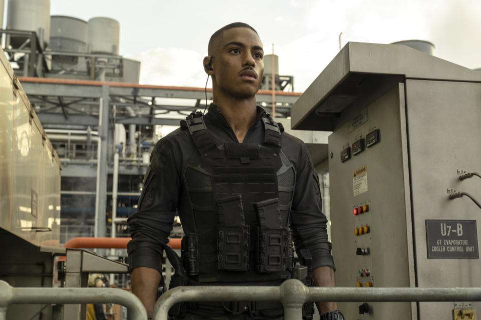 This image released by Amazon shows Keith Powers in a scene from "The Tomorrow War." (Frank Masi/Amazon via AP)