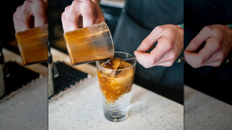 Pouring espresso into an 'espressoda'