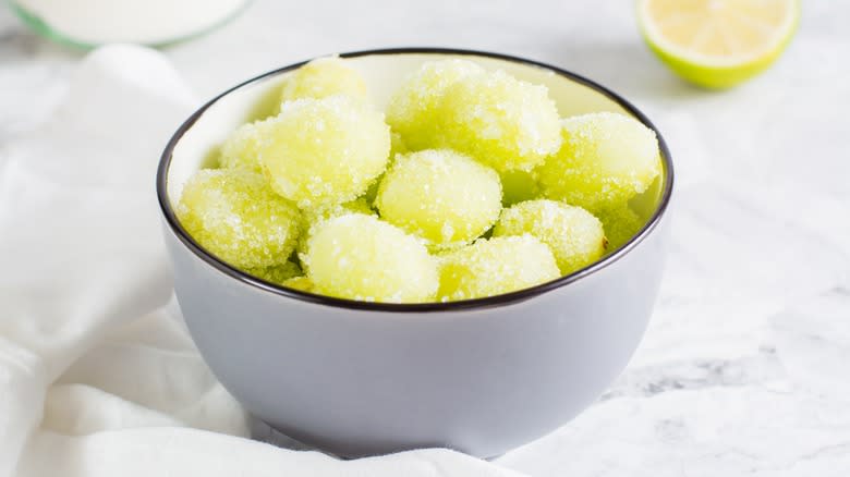 Bowl of frozen grapes
